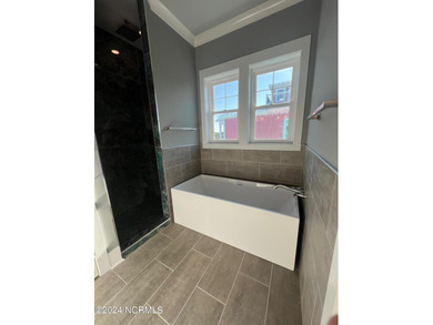 NEWLY CONSTRUCTED 5 BEDROOM PLUS FLEX ROOM HOME WITH SALT WATER