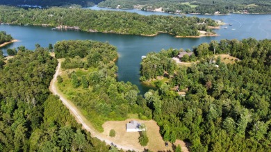 Cozy Smith Lake getaway available just in time for summer! Enjoy - Lake Home For Sale in Double Springs, Alabama