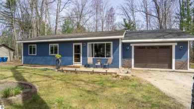 Cedar Hedge Lake Home For Sale in Interlochen Michigan