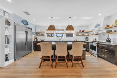 SOLD FURNISHED AND TURNKEY, ALLOWING FOR A SEAMLESS MOVE IN - photo 4