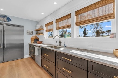 SOLD FURNISHED AND TURNKEY, ALLOWING FOR A SEAMLESS MOVE IN - photo 10