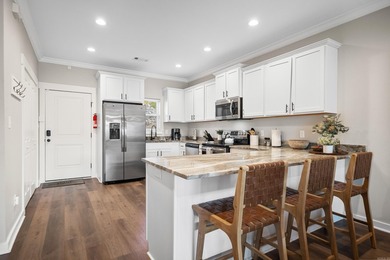 ~Turnkey. Waterfront. Income-ready.~ Built in 2020, this - photo 11