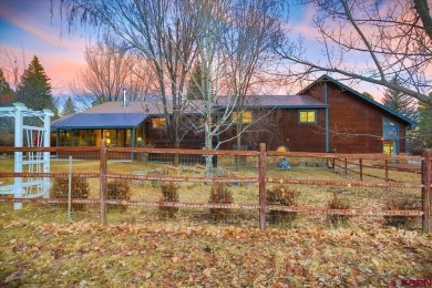 Over  1/2  acre on the Pagosa Springs Golf course with a - photo 3