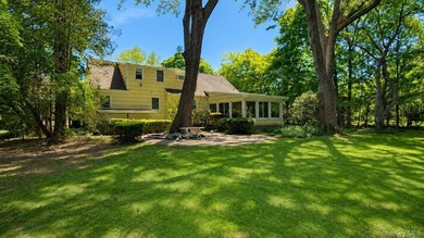 Set on a level half-acre along one of Cold Spring Hills' most - photo 24