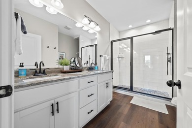 ~Turnkey. Waterfront. Income-ready.~ Built in 2020, this - photo 25
