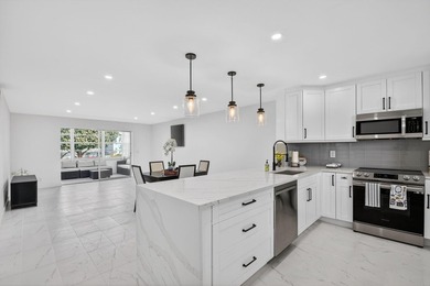 * BLDG is FHA APPROVED. Beautifully renovated 2nd-floor corner - photo 1