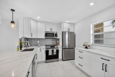 * BLDG is FHA APPROVED. Beautifully renovated 2nd-floor corner - photo 2