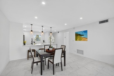 * BLDG is FHA APPROVED. Beautifully renovated 2nd-floor corner - photo 9