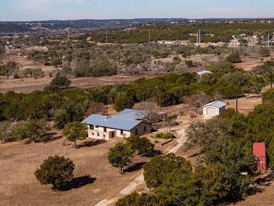 Welcome to this one-owner custom home blending timeless Tuscan