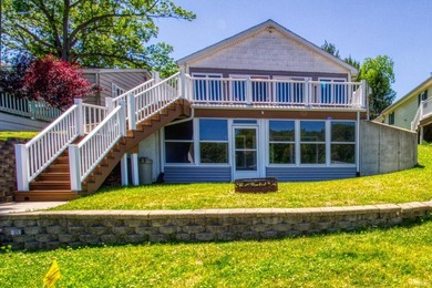 Experience the best of all-sports lake living with this - photo 1