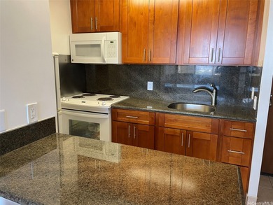 Experience convenient city living at 2040 Nuuanu. This move-in - photo 4