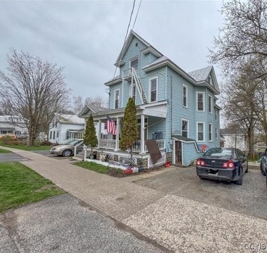 Awesome 4-unit opportunity awaits you in the Village of Theresa! - photo 2