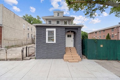 Welcome to this beautifully renovated, move-in-ready 2-family - photo 1
