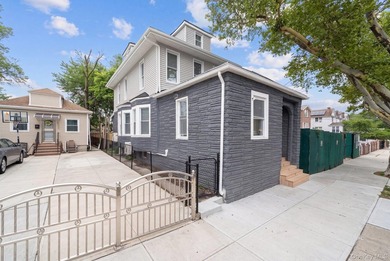 Welcome to this beautifully renovated, move-in-ready 2-family - photo 2