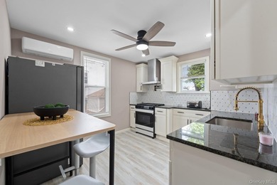 Welcome to this beautifully renovated, move-in-ready 2-family - photo 5