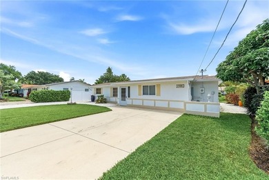 This charming Florida bungalow sits along the Imperial River, is - photo 3