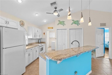 Welcome to your coastal paradise! This ELEVATED canal home with - photo 13