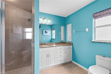 Welcome to your coastal paradise! This ELEVATED canal home with - photo 18