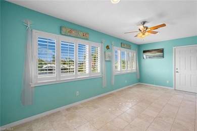 Welcome to your coastal paradise! This ELEVATED canal home with - photo 20