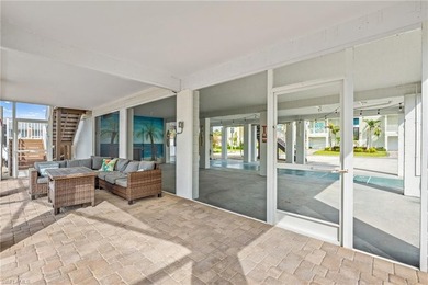 Welcome to your coastal paradise! This ELEVATED canal home with - photo 21