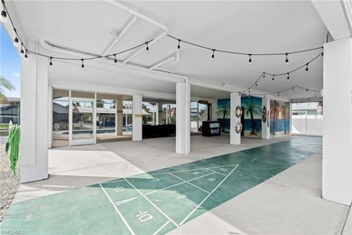 Welcome to your coastal paradise! This ELEVATED canal home with - photo 27