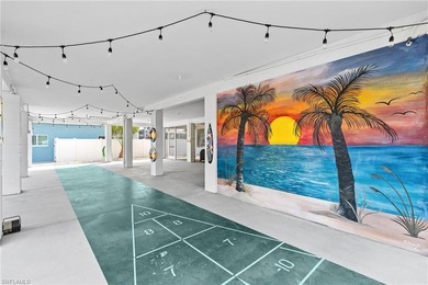Welcome to your coastal paradise! This ELEVATED canal home with - photo 29
