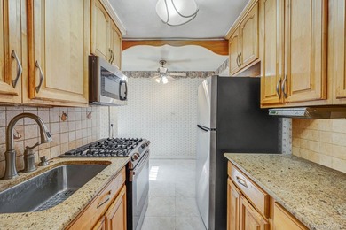 Welcome to this inviting 2-bedroom, 1-bath co-op nestled on a - photo 13