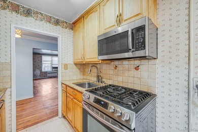 Welcome to this inviting 2-bedroom, 1-bath co-op nestled on a - photo 14