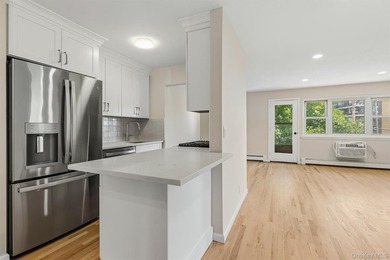Welcome home to this beautifully renovated top-floor, walkup - photo 6
