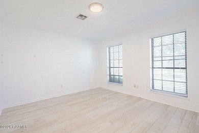 Welcome to this spacious two-story townhouse offering