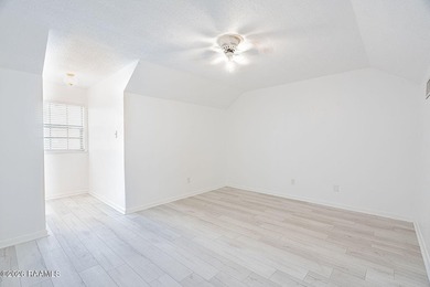 Welcome to this spacious two-story townhouse offering