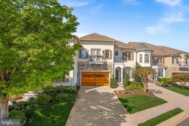 Nestled in the prestigious River Creek community, this exquisite - photo 1