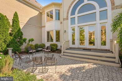 Nestled in the prestigious River Creek community, this exquisite - photo 2