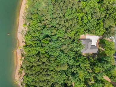 Lakefront living at its finest on Greers Ferry Lake in the - photo 2