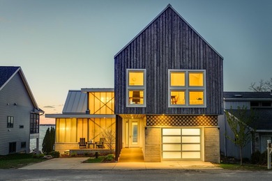 Lakefront luxury meets architectural distinction in this - photo 3