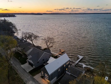 Lakefront luxury meets architectural distinction in this - photo 4