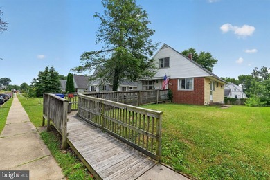 Welcome to 2729 Chesley Ave, where timeless Cape Cod charm meets - photo 2