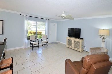 RARE FIND...1st Floor remodeled 2 Bed/2 Bath partially furnished - photo 11