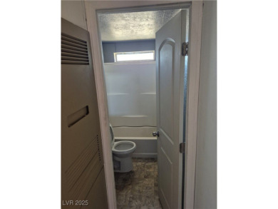 Fixer Upper with Huge Potential on 1.1 Acres in Pahrump!  Bring