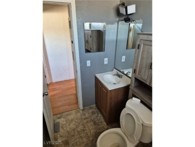 Fixer Upper with Huge Potential on 1.1 Acres in Pahrump!  Bring