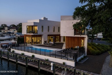 A rare modern waterfront retreat, this architect-designed home - photo 4