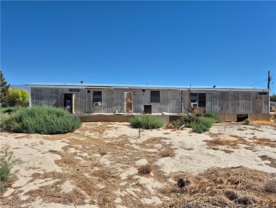 Fixer Upper with Huge Potential on 1.1 Acres in Pahrump!  Bring
