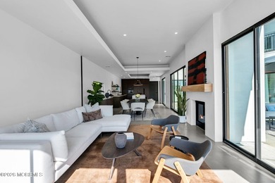 A rare modern waterfront retreat, this architect-designed home - photo 7