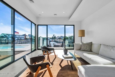 A rare modern waterfront retreat, this architect-designed home - photo 8