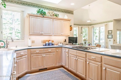 Located in the Pinehurst No. 6 neighborhood, this custom-built - photo 13