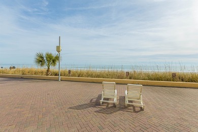 PRICED TO SELL. Rarely do oceanfront ground level condos become