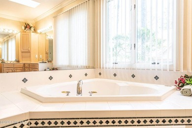 Located in the Pinehurst No. 6 neighborhood, this custom-built - photo 24