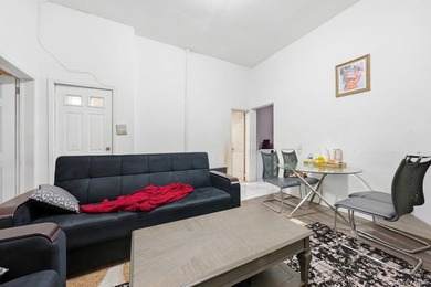 Brick 3-family home in the Grand Concourse featuring three - photo 5