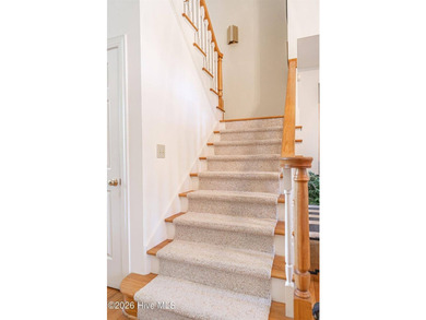 Located in the Pinehurst No. 6 neighborhood, this custom-built - photo 28