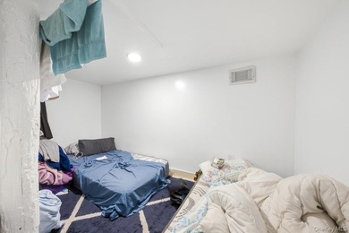 Brick 3-family home in the Grand Concourse featuring three - photo 9